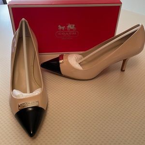 Coach Brand New Black and Cream 3” Heels with Coach Emblem.